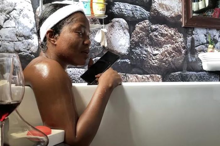 MzBel grants interview from her bathtub