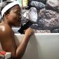 MzBel grants interview from her bathtub