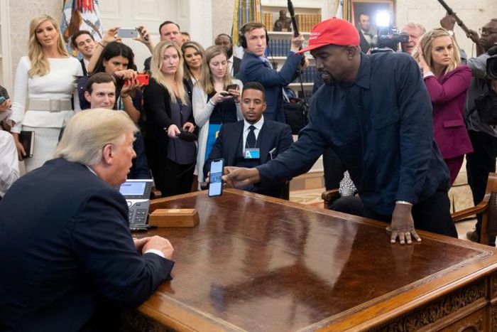 President Donald Trump meeting rapper Kanye West in the White House on 11 October 2018