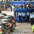 Guests drive past barriers near the Office for Safeguarding National Security of the Central People's Government in the Hong Kong Special Administrative Region after its official inauguration