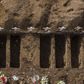 A COVID-19 victim is buried at the General Cemetery in Santiago, Chile