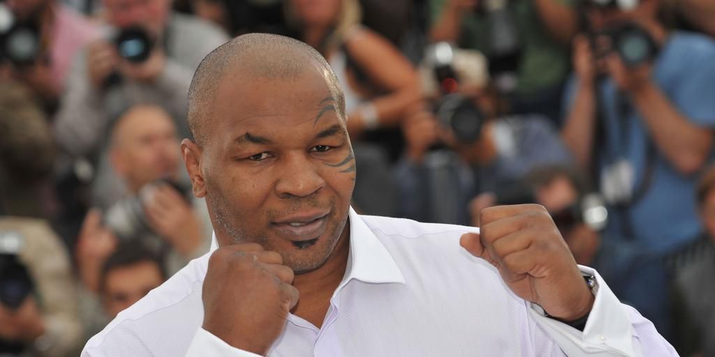 Watch Mike Tyson Hammer His Trainer in New Video