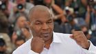 Watch Mike Tyson Hammer His Trainer in New Video