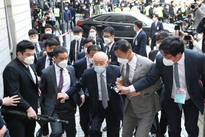 Former dictator Chun Doo-hwan (C) remains hugely divisive in South Korea