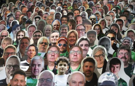 Still life: Cardboard cutouts of fans at the Borussia Moenchengladbach v Bayer Leverkusen game