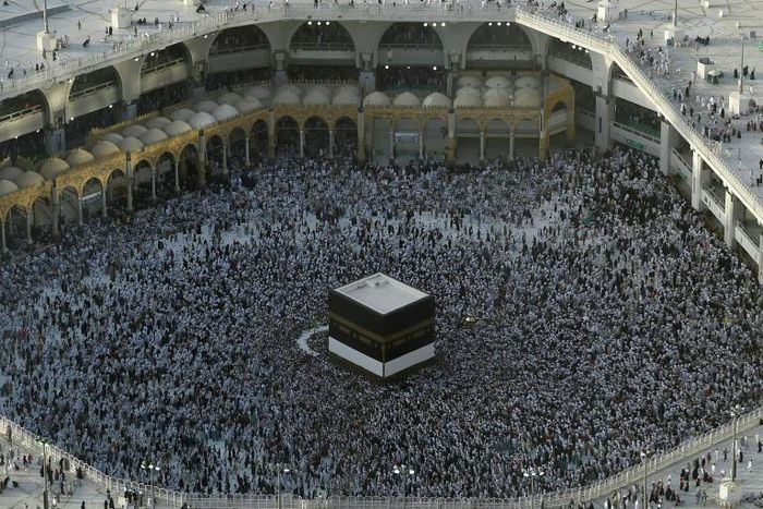 Muslim pilgrims gather in August 2019 around the Kaaba, Islam's holiest shrine, at the Grand Mosque in Saudi Arabia's holy city of Mecca prior to the start of last year's hajj pilgrimage