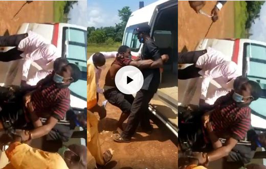 Angry officials tie up stubborn COVID-19 patient with rope before dumping him in ambulance (video)