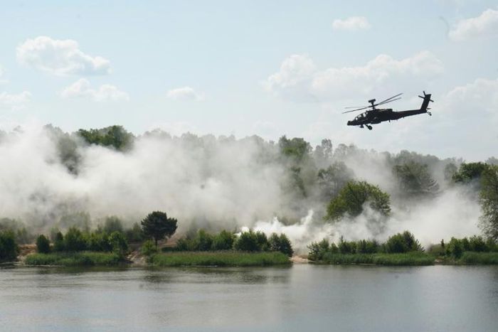 Polish and US troops took part in the Defender-Europe 20 joint military exercise on June 17 -- in recent years, Warsaw has closely aligned itself with Washington, to the consternation of some EU and NATO partners