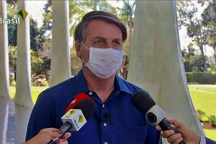 Brazilian President Jair Bolsonaro said he was feeling "perfectly well" after testing positive for COVID-19