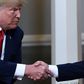 US President Donald Trump and Russian President Vladimir Putin, who are considering a new summit alongside other leaders, shake hands during a July 2018 meeting in Helsinki