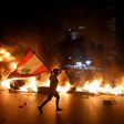 Lebanese protesters angered by a growing economic crisis set tyres on fire and blocked roads