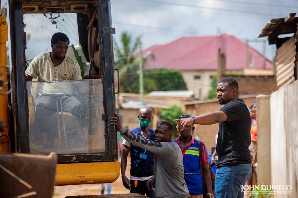 John Dumelo dredges gutter