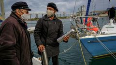 Juan Manuel Ballestero (R), with his father Carlos in Mar del Plata, Argentina, after sailing home from Portugal due to pandemic travel restrictions to see his parents