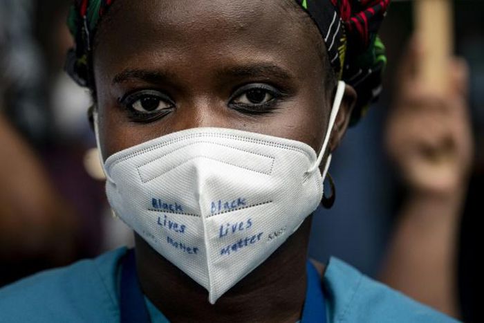 Nurses and healthcare workers attend a 'Black Lives Matter' rally in front of Bellevue Hospital on June 4, 2020, in New York City