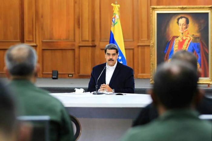 President Nicolas Maduro, shown in a handout picture released by the Venezuelan Presidency speaking to members of the Bolivarian National Armed Forces (FANB), announced that two Americans were arrested for taking part in the failed "invasion"