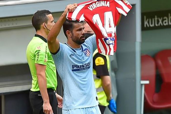 Diego Costa celebrated his goal by holding up the shirt of Virgina Torrecilla, a player from Atletico's women's team, who underwent surgery on a brain tumour last month.