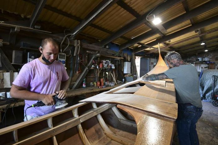 Gondola builders at the Roberto Dei Rossi boatyard in Venic