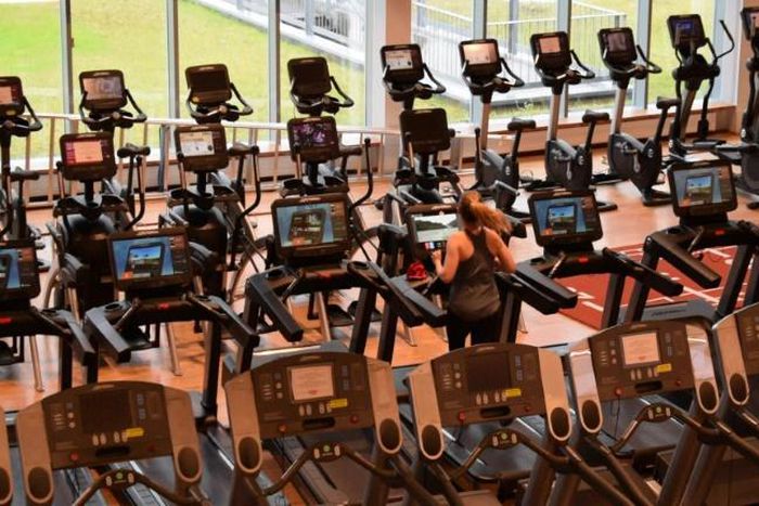 Members return to World Class Laugar, one of Iceland's biggest gyms, after the goverment lifted more coronavirus restrictions on Monday