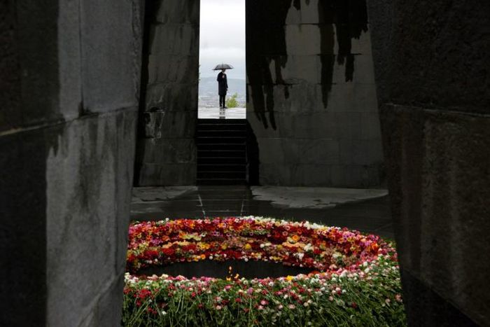 Flowers placed at a memorial in Yerevan as Armenia marks the 105th anniversary of the Armenian genocide