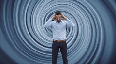 Businessman against vortex background