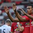 Anthony Martial (right) scored his first career hat-trick for Manchester United