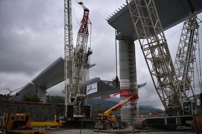 Construction of the gleaming structure in northern Italy's coastal Liguria region has continued night and day throughout a national lockdown