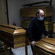 Giampiero Palmero, owner of a funeral home in Revello, laments having to seal coffins quickly before family can bid farewell to loved ones, as the coronavirus alters funeral traditions in Italy