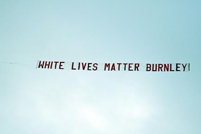 The start to Manchester City's Premier League match against Burnley on Monday was marred by a plane flying overhead with a banner reading "White lives matter Burnley"