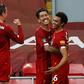 Liverpool captain Jordan Henderson (left) hailed the impact of manager Jurgen Klopp on the club
