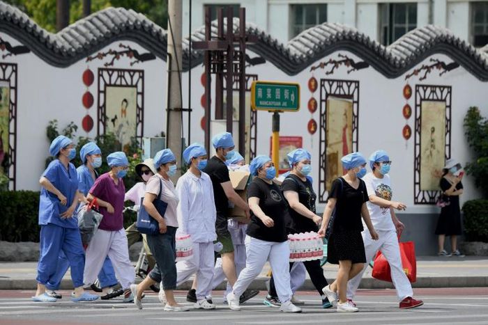 Authorities in the Chinese capital Beijing are rushing to contain a new outbreak of the coronavirus linked to a wholesale food market