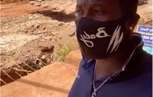 Asamoah Gyan on site of construction