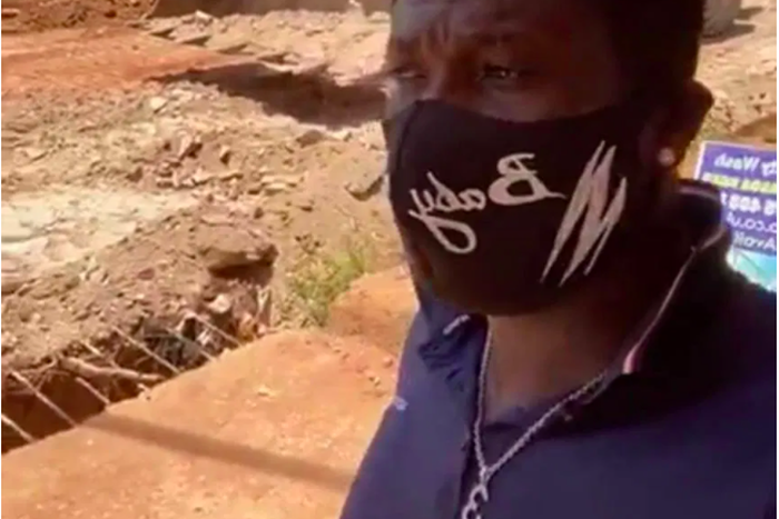 Asamoah Gyan on site of construction