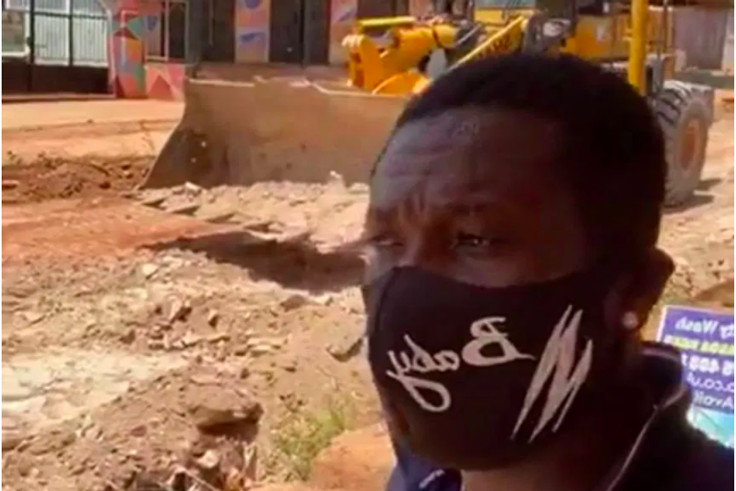 Asamoah Gyan on site of construction