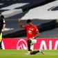 Manchester United striker Marcus Rashford (right) takes a knee before kick-off against Tottenham