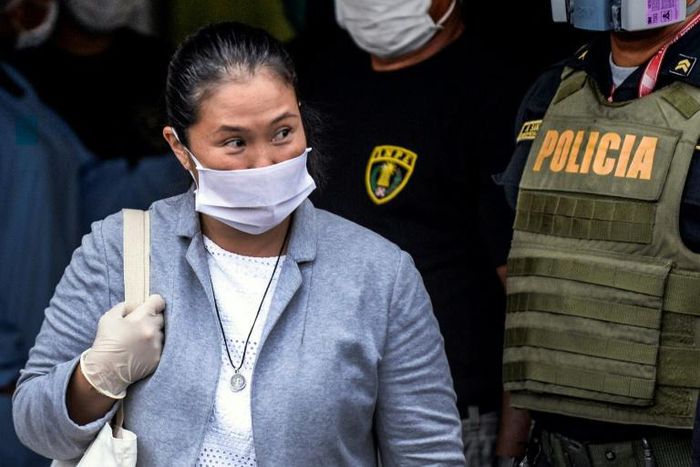 Peruvian politician Keiko Fujimori wears a face mask -against the spread of the COVID-19 coronavirus- while leaving Santa Monica jail in Lima on May 04, 2020