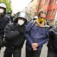 Police remove a demonstrator during he anti-confinement protest in Berlin