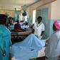 Some Health officials at the Kakamega County Referral Hospital checking on a patient at one of the hospital wards. (Facebook)