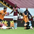 Wolves midfielder Leander Dendoncker (C) celebrates against Aston Villa