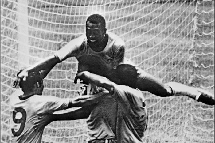 Pele leapt to celebrate with teammates Tostao, Carlos Alberto and Jairzinho