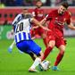 Liverpool midfielder Adam Lallana (R) has agreed a new short-term contract for the rest of this season
