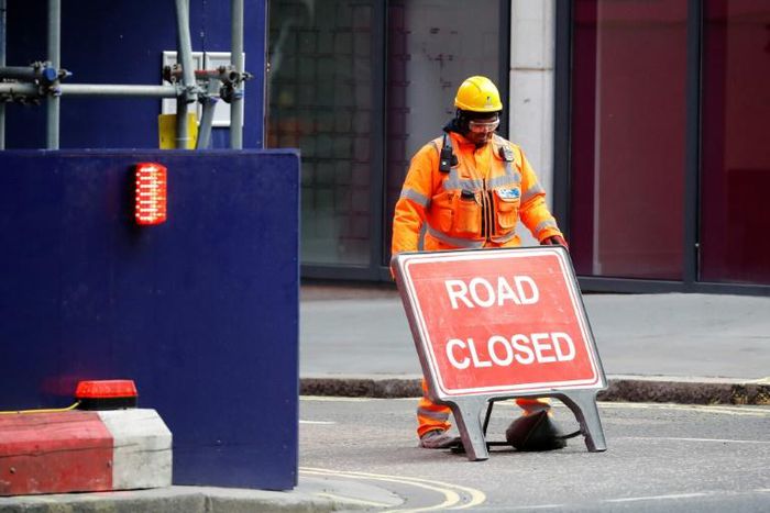 Britain's economy shrank two percent in the first three months of the year, rocked by the fallout from the coronavirus pandemic, official data shows