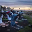 Muslims pray in Cape Town before looking for the crescent moon that signals the start of Ramadan