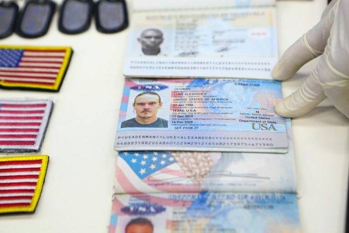 A handout picture released by the Venezuelan Presidency shows on May 4, 2020, passports of US citizens arrested by security forces in relation to a failed maritime 'invasion'