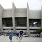 A child playing football outside Paris Saint-Germain's Parc des Princes. PSG were 12 points clear at the top of Ligue 1 when the French season was suspended