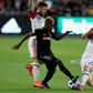 DC United midfielder Chris Durkin, at right against Los Angeles FC's Latif Blessing, was transfered to Belgium's Sint-Truidense on Thursday