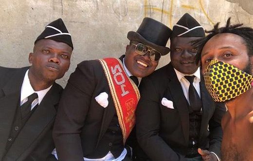 Wanlov with pallbearers