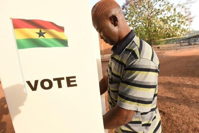 A man casts his vote in the presidential election in Bole district, northern Ghana, on December 7, 2016