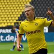 Erling Braut Haaland celebrates after scoring the opening goal for Borussia Dortmund against Schalke