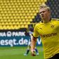 Erling Braut Haaland celebrates after scoring the opening goal for Borussia Dortmund against Schalke