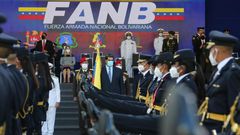 Venezuela President Nicolas Maduro (center) takes part in a ceremony to hand out promotions to military officers